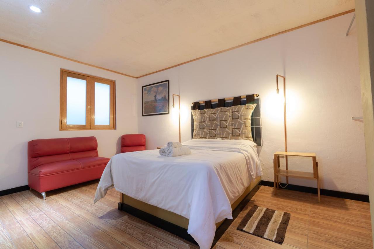 Pascual Inn Suites Чолула Экстерьер фото