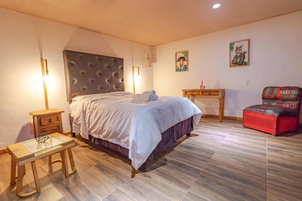 Pascual Inn Suites Чолула Экстерьер фото